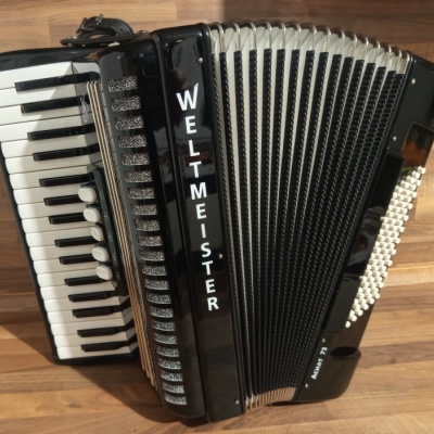 Akordeon (harmonika, heligonka) Weltmeister Achat,NOVÝ